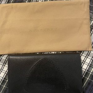 Black and yellow foldable Burberry wallet in EUC with original dust bag.